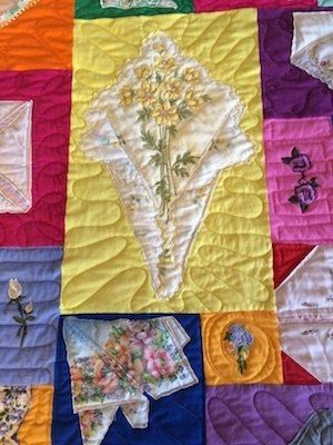 Example of how a hankie was folded and used in a quilt. hankie quilt by Too Cool T-shirt Quilt