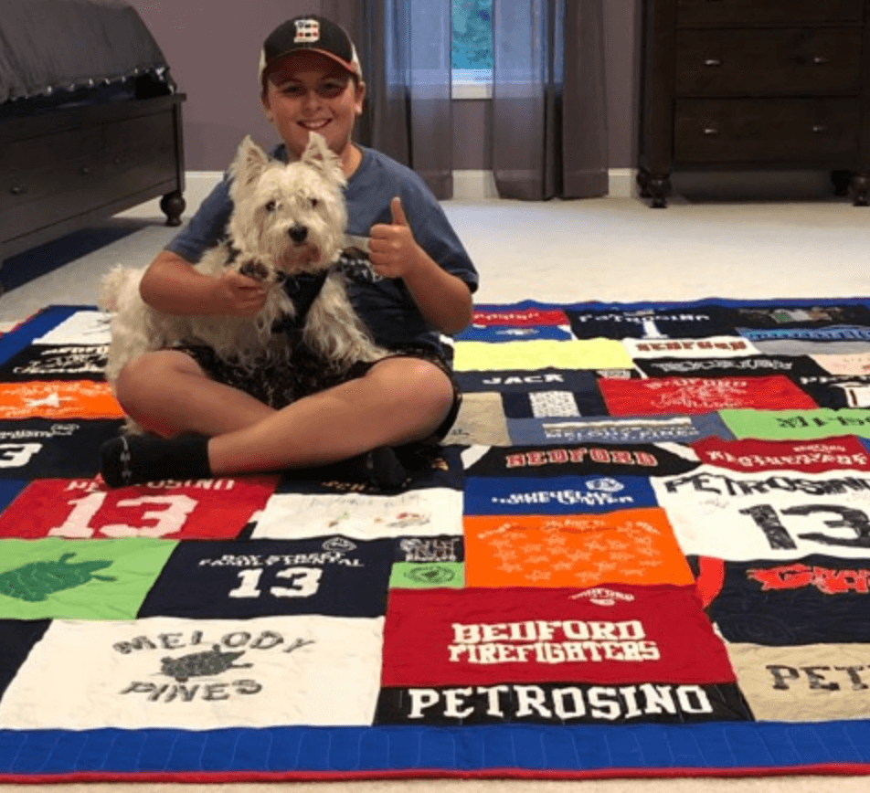 Boy & Dog on a quilt