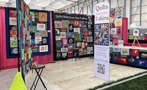 Too Cool T-shirt Quilts displaying our quilts at a marathon Expo