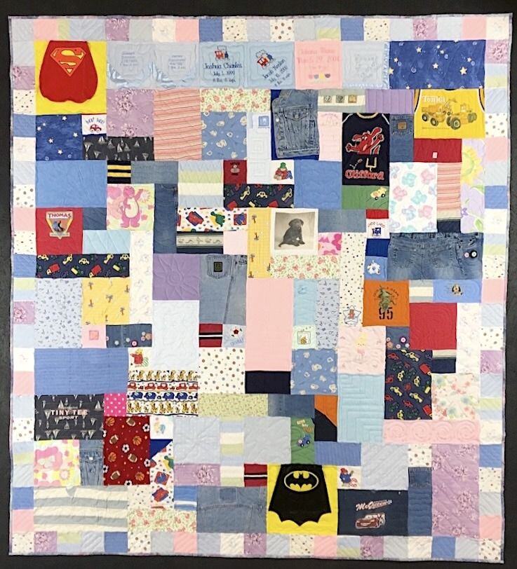 simple baby clothes quilt by Too Cool T-shirt Quilts