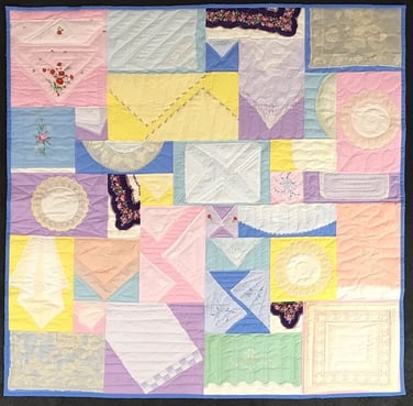  hankie quilt by Too Cool T-shirt QuiltHankies made into a quilt on a pastel background