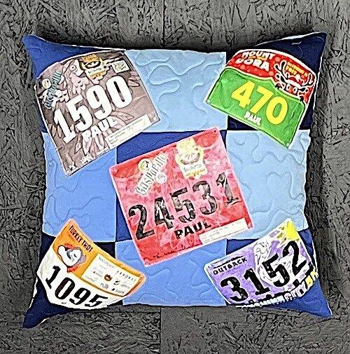 Race bib numbers on a pillow