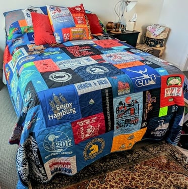 Runners quilt and pillow on bed