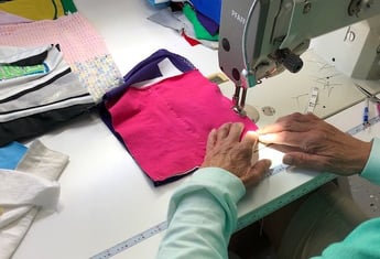 Sewing at Too Cool T-shirt quilts.