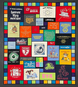 Stained-glass T-shirt quilt made by Too Cool T-shirt Quilts - very well designed and crafted. 