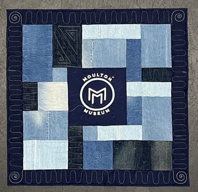 Wall hanging  blue jean quilt by Too Cool T-shirt Quilts