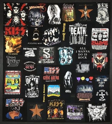 An all black band concert T-shirt quilt featuring many different bands. 