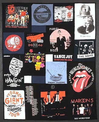 Rock concert T-shirt quilt. This quilt includes T-shirts from the Maroon 5 and the Rolling Stones. By Too Cool T-shirt Quilts