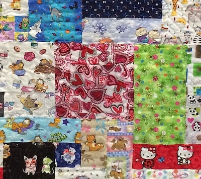 close up of a scrubs quilt by Too Cool T-shirt quilts