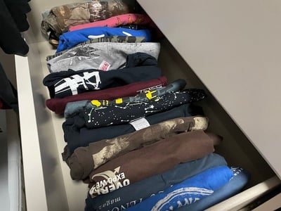 dresser drawer of T-shirts