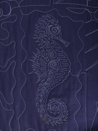 seahorse tracking on the back of a T-shirt quilt by Too Cool T-shirt Quilts